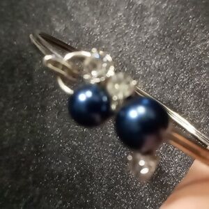 Blue faux pearl stainless wire hook & loop bracelet.